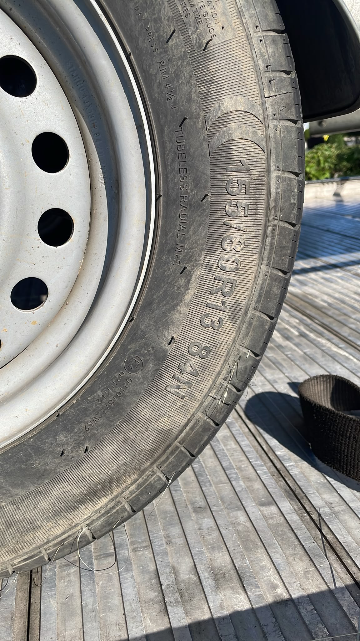 truck roadside assistance on site — Truck Tyre Service in a Distribution Centre Car Park: Trailer Wheel Change in Gütersloh