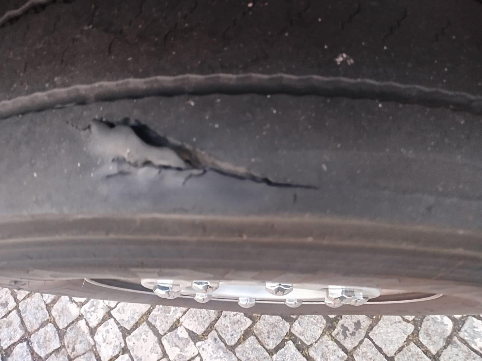 truck roadside assistance on site — Truck Tyre Service in a Distribution Centre Car Park: Trailer Wheel Change in Gütersloh