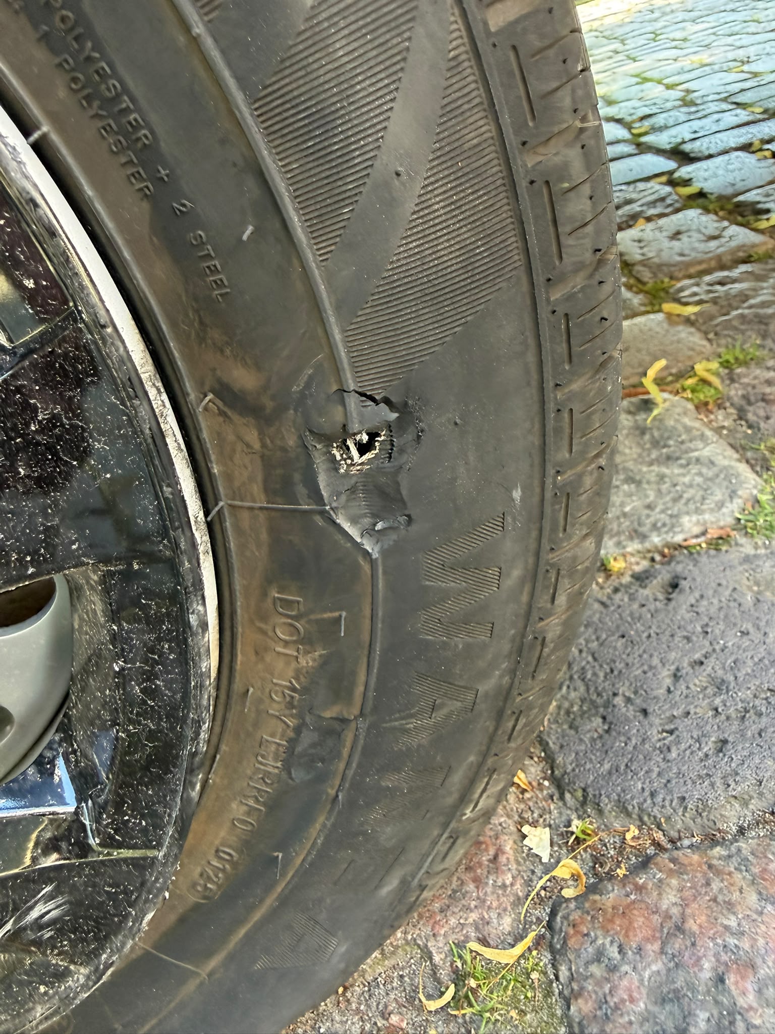 truck roadside assistance on site — Truck Tyre Service in a Distribution Centre Car Park: Trailer Wheel Change in Gütersloh