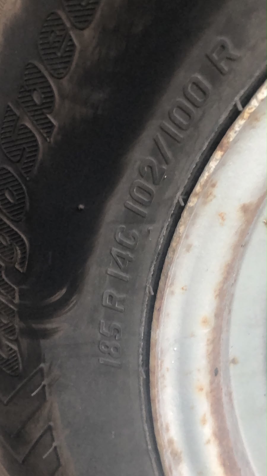 truck roadside assistance on site — Truck Tyre Service in a Distribution Centre Car Park: Trailer Wheel Change in Gütersloh